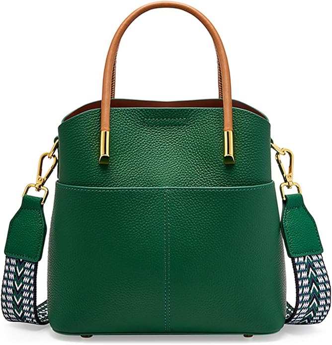 aesthetic winter outfit: cozy green sweater, denim & chic handbag Aesthetic dark green crocodile-patterned handbag with a gold clasp, stylish accessory for winter fashion.